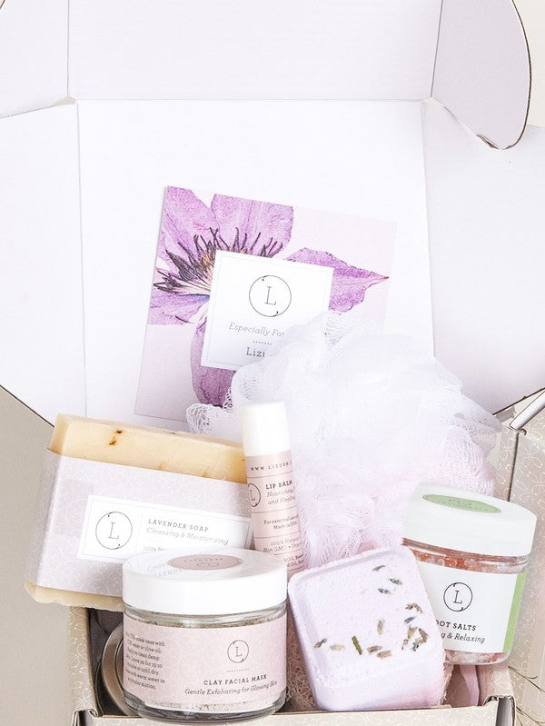Cute Lavender Gift Set. All Natural Bath Set includes:
* Lavender Soap Bar (full size)
* Facial clay mask
* Bath Bomb
* Shower steamer
* Natural Lip Balm
* Soap saver
* Gorgeous designed box(5''x5'x3'')